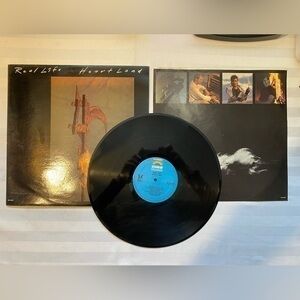 HEARTLAND Real Life vinyl lp album. 1983. Record is in pristine condition